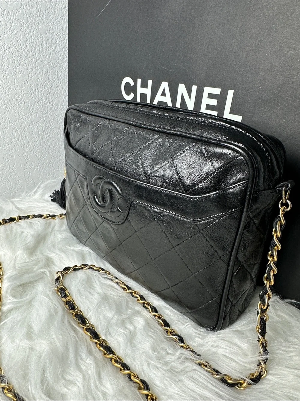 CHANEL Black Quilted Lambskin Crossbody with Tassel and Chain